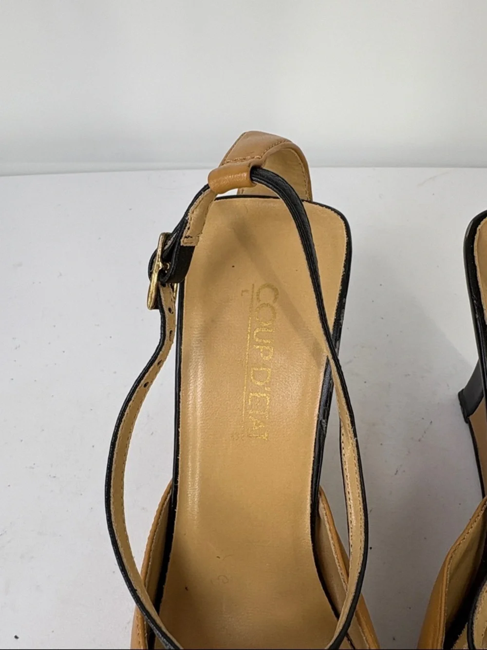 Coup DEtat refined tan